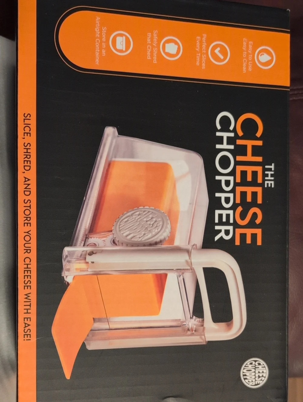 The Cheese Chopper Manual Cheese Slicer - Orange & Clear